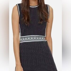 Tory Burch fit and flare knit dress
Navy blue  , tan and cream dots